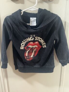 the Rolling Stones Kids Black Hoodie with Red Plaid Tongue Graphic